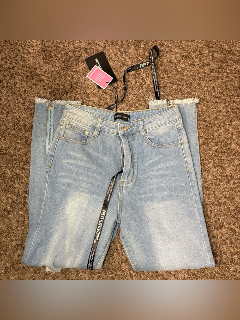 PrettyLittleThing Light Wash Zip Back Distressed Jeans – Size 4